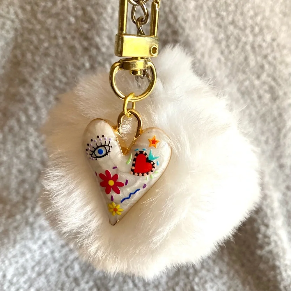 🎅🏻 SALE! White Fuzzy ball with heart charm bag charm Or key chain brand new